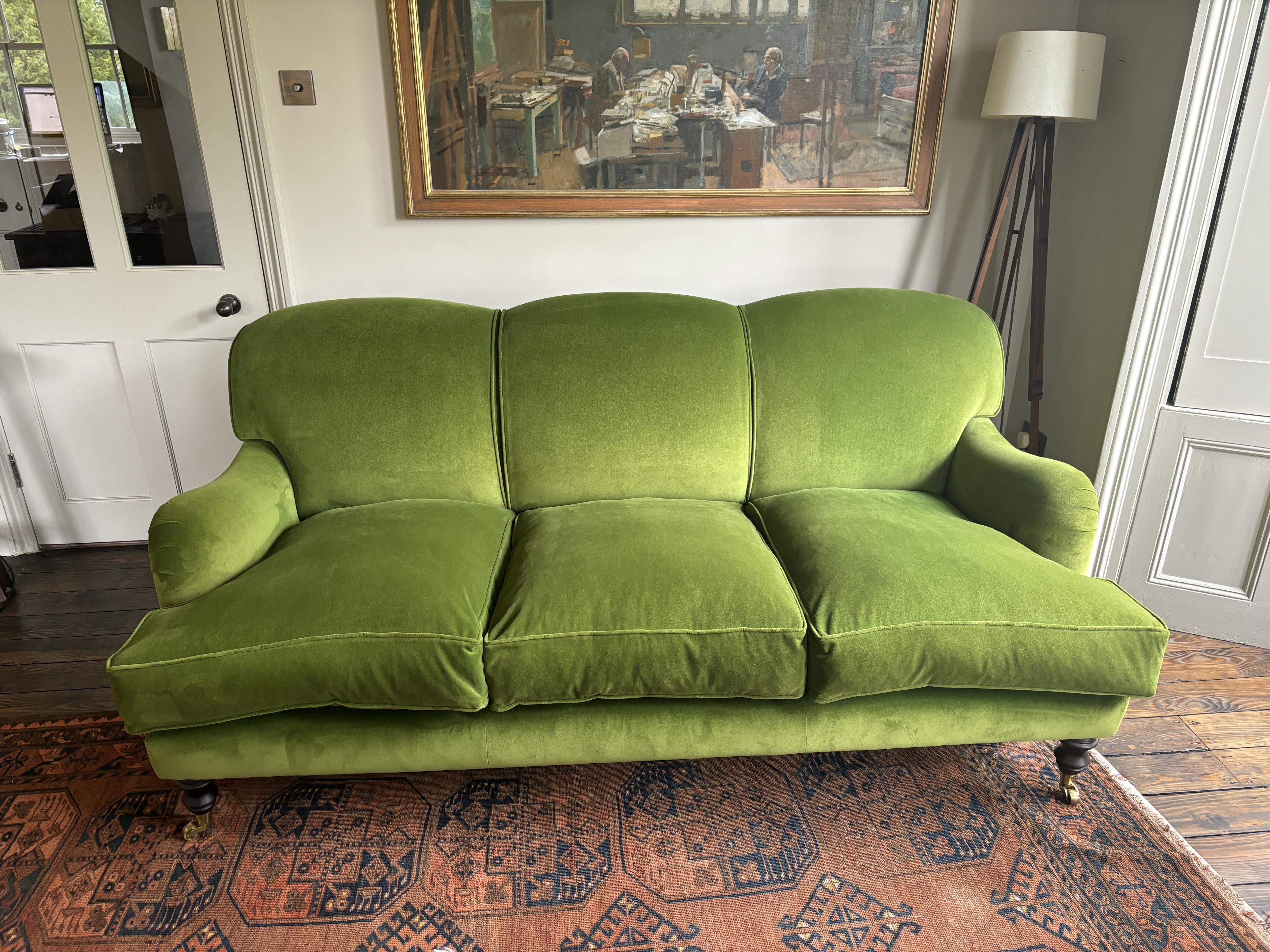 A Sofa Workshop 'Lady May' English roll arm green velvet four seater settee, Howard style sofa, seating generously feather filled, width 200cm, depth 110cm, height 84cm seat height 48cm. Condition - very good